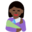 woman feeding baby, dark skin tone